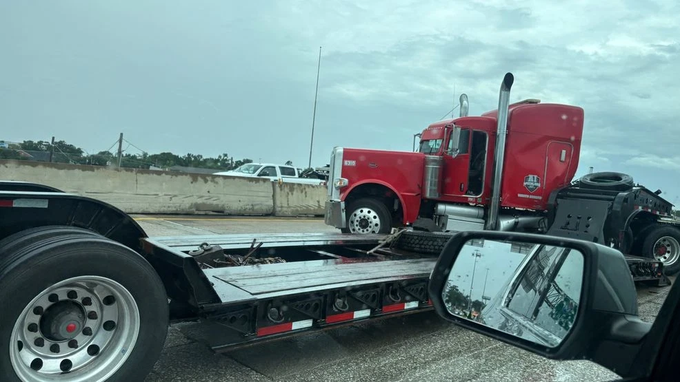 UPDATE: I-10 West reopens near 11th Street after big rig jackknifes, spills diesel